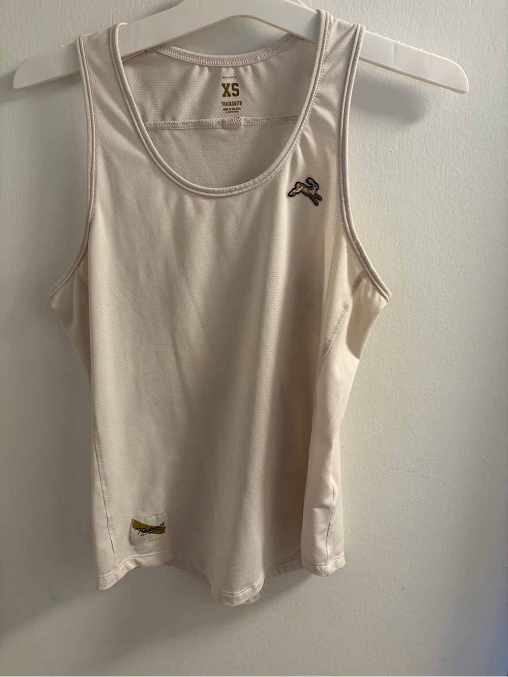 Tracksmith Cream Performance Tank with Rabbit Logo